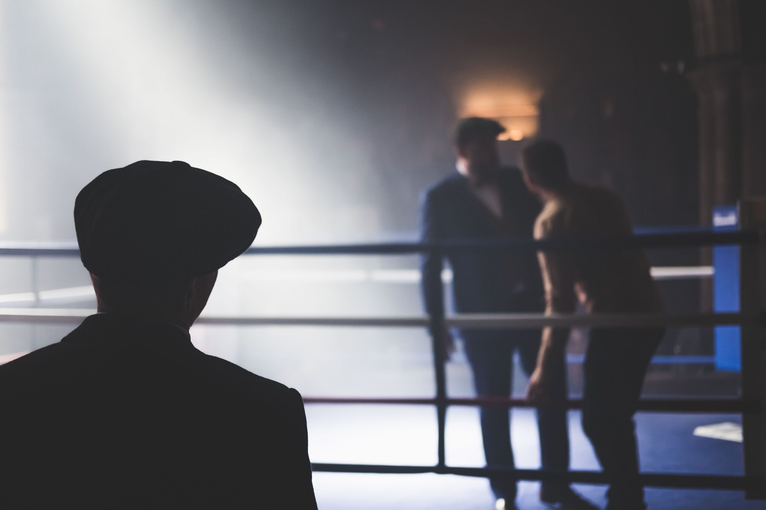 A scene in a boxing ring two men film noir Dan Burton image from Unsplash