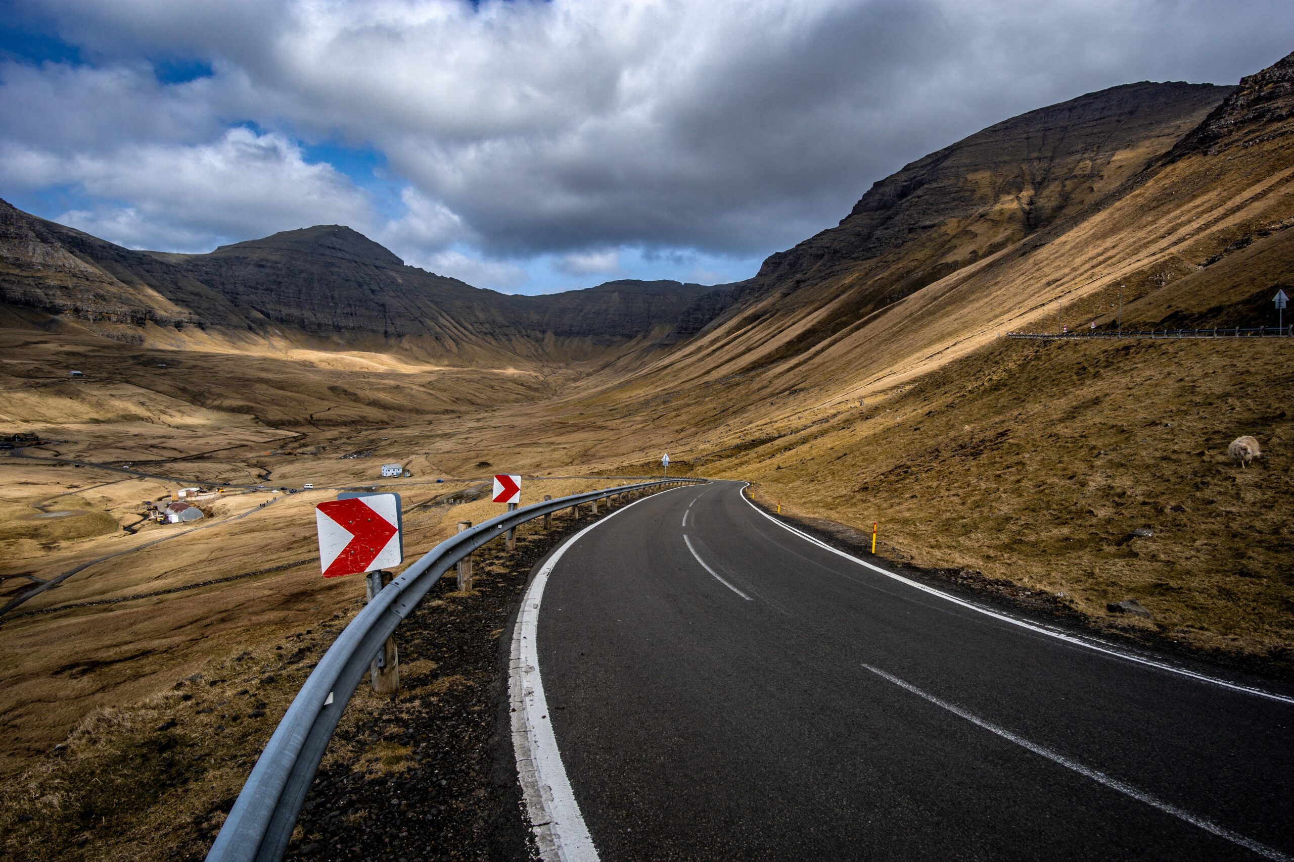 michael-fousert-blue highway through desert scape valley between pasture SW USA land-unsplash