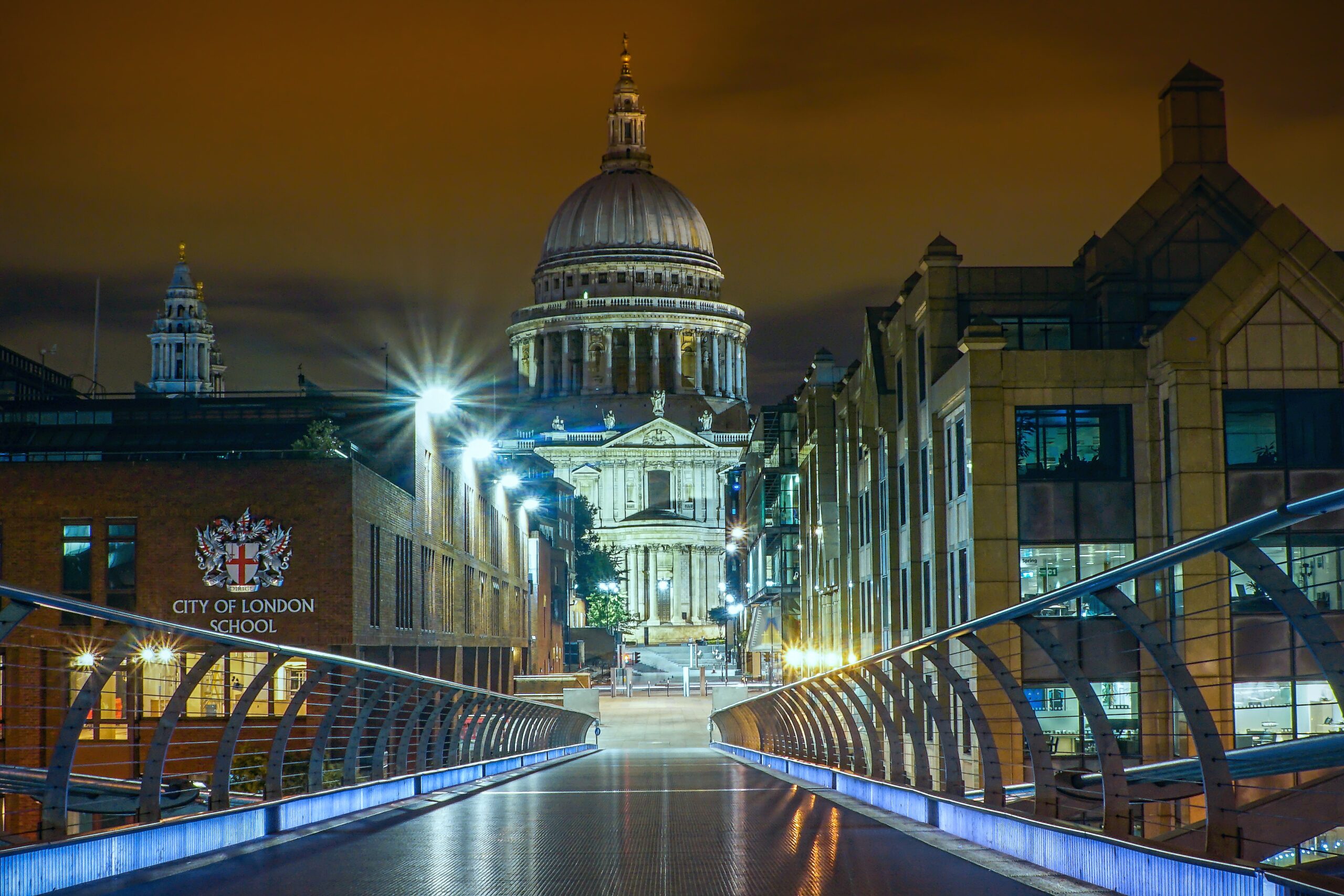 stefan-siegel-Millenium Bridge at night with City of London School -unsplash