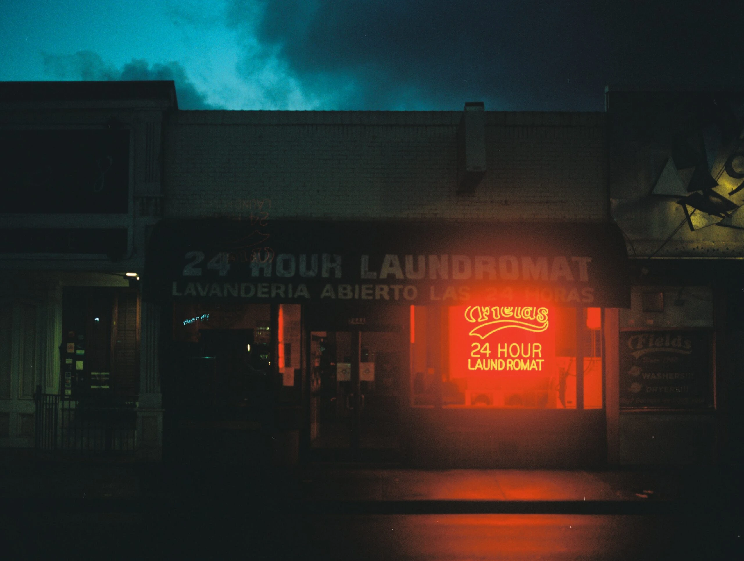 andy-grizzell-rain water splashing on street-unsplash