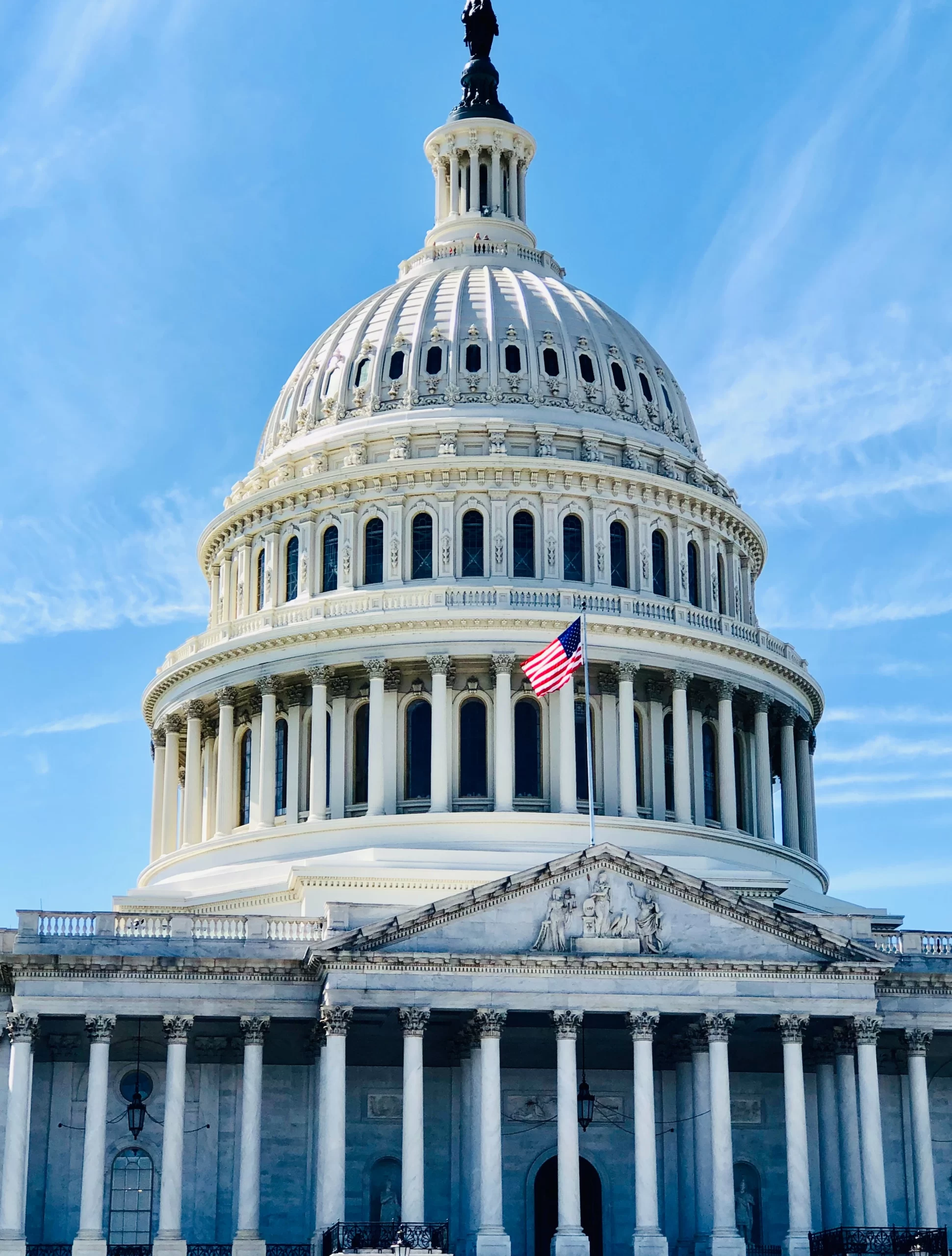 ajay-parthasarathy-Capitol Rotunda exterior up close unsplash