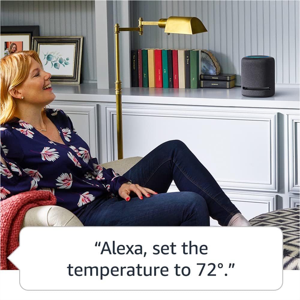 Amazon Echo Bluetooth Speaker in Use at home on shelf while owner listens sitting in chair.