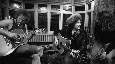 During downtime from the tour, Dylan jams with Roger McGuinn and Gordon Lightfoot.